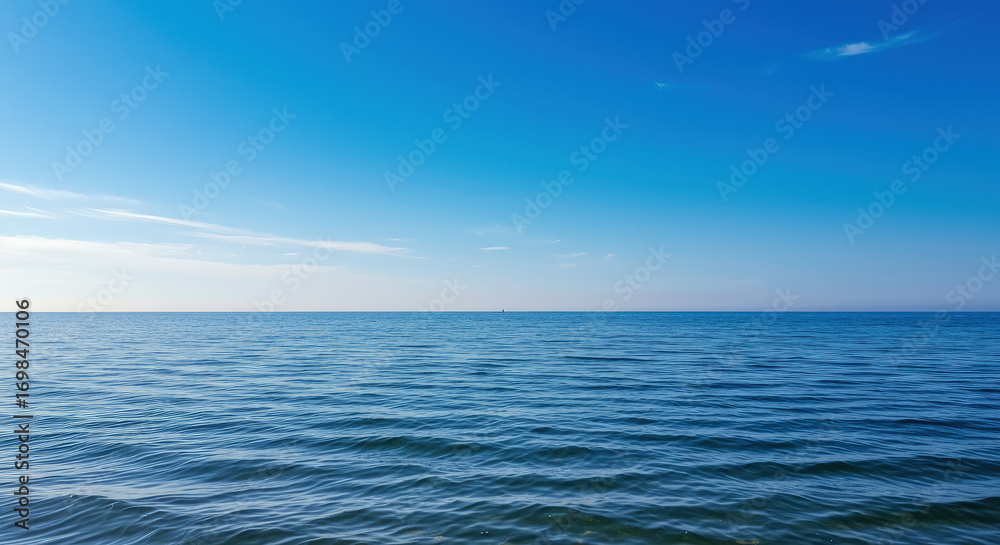 Obraz premium Blue sea calm water clear sky