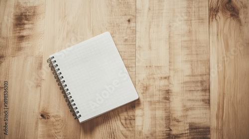 Blank notebook on wooden table