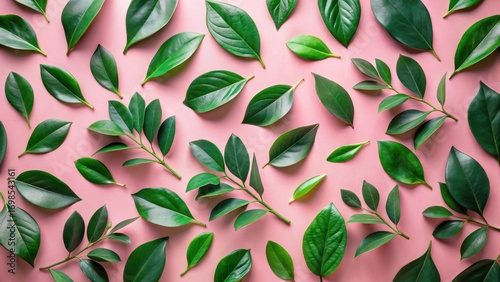 Vibrant Green Foliage Arranged on a Pastel Pink Background, Creating a Serene and Harmonious Botanical Pattern