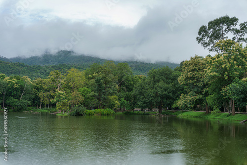 landscape lake views at Ang Kaew Chiang Mai University in nature forest Mountain atmosphere rain fog sky abstract with white clouds. cloudy sky background