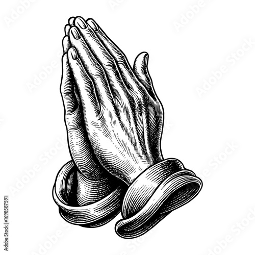 Hands of a believer folded in prayer.