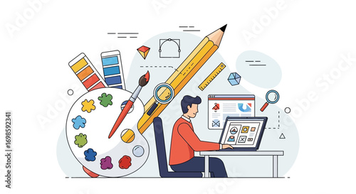 A graphic designer sits at a laptop, surrounded by a palette, brush, pencil, cutter, and design elements, working on a project.
