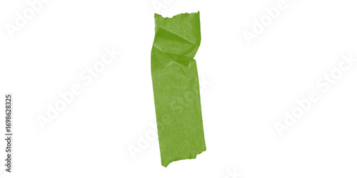 An isolated torn piece of vibrant green masking tape crumpled and adhesive against a stark black