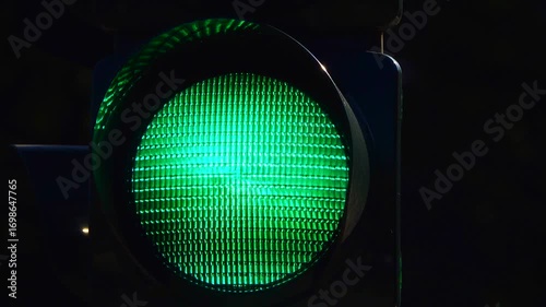 GO concept on the road, green light: the traffic light turns green