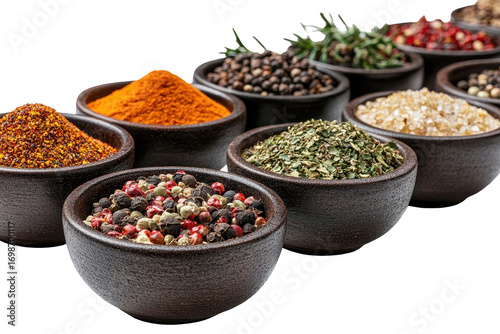 Fototapeta Naklejka Na Ścianę i Meble -  Various spices in rustic bowls arrayed on a white background, offering a visual feast of culinary flavors and ingredients for diverse recipes