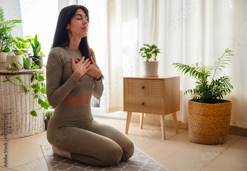 Εκτύπωση καμβά Young Woman practicing meditation and breathing exercises