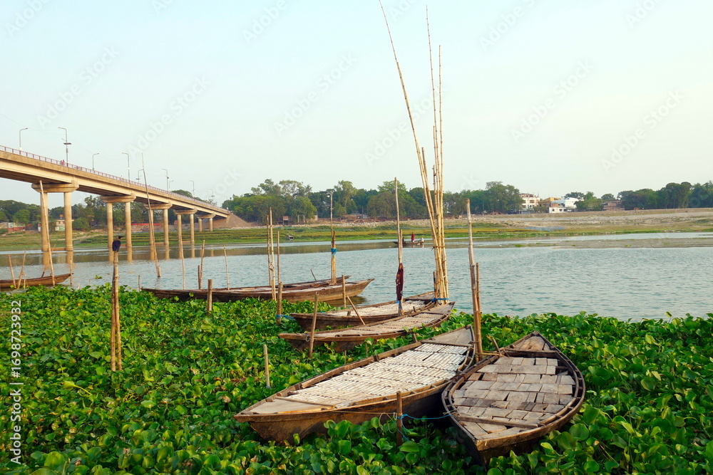 Obraz premium Boats on a river in Bangladesh. Ganges River Boat Transport