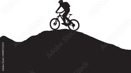 Silhouette of a mountain biker on a hilltop cycling bicycle