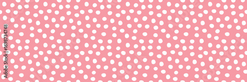 White polka dot seamless pattern on pink background, minimalist design