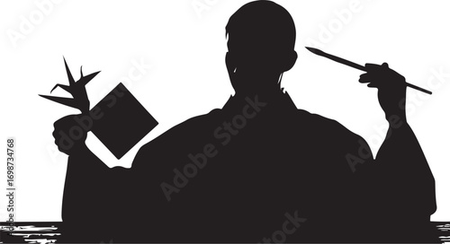 Silhouette of a person in traditional Japanese attire holding a square paper and a brush kimono