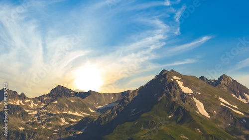  mountain chain in a snow at the dramatic sunset, natural travel time lapse scene
