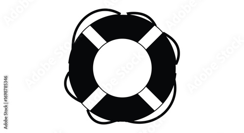 a black and white lifebuoy floating on water surface