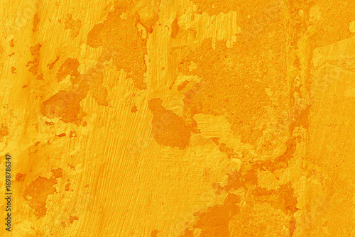 Texture old concrete wall orange bright peeling stucco paint cement background