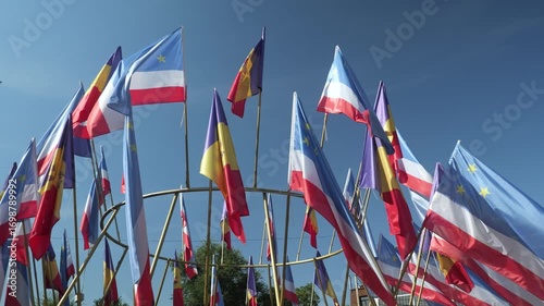 Rows of Gagauzia and Moldova flags waving in the wind during celebration in Comrat.