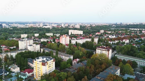 Drone aerial view of residential district in Chisinau, Moldova. Drone footage of Chisinau showing residential blocks, streets and greenery in a suburban area.