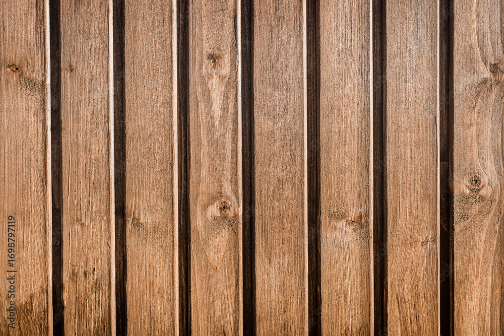 Naklejka premium Wooden brown fence texture natural wood board plank background nature