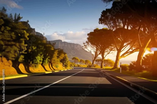 Scenic Road at Sunset with mountain and ocean in Cape Town