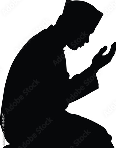 Silhouette of a Muslim man praying in faith, devotion, peace, and worship, showing religious expression during Islamic prayer moment