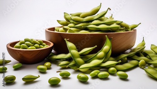 Wallpaper Mural edamame pods and beans scattered artistically on a white background with wooden bowls Torontodigital.ca