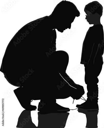 Silhouette of father kneeling down to tie child’s shoe, family love, parenting care, father-child bond, nurturing moment, reflection on floor.