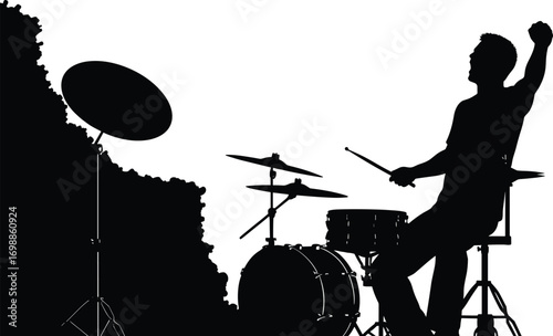 Silhouette of male drummer celebrating while playing drum set with drumsticks, sitting on stool in energetic live music performance vector.