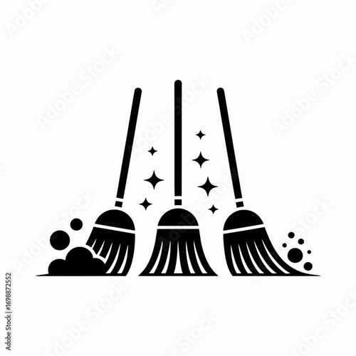 Three brooms sweeping dust and sparkles on a white background