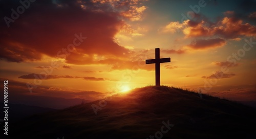 Silhouette of Christian Cross Against Beautiful Sunset Landscape on Hilltop