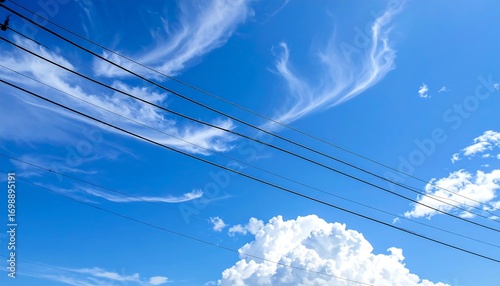 High angle view of clouds and power lines