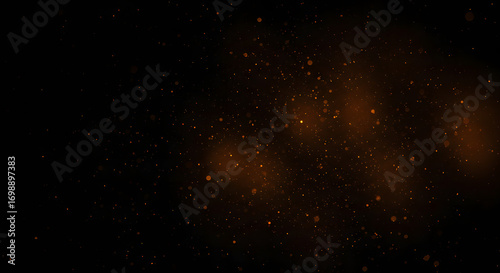 Abstract glowing particles on a dark background.