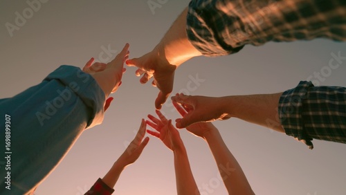 Tableau sur toile Team spirit men, women unite together