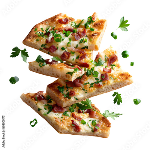 Flying slices of Tarte Flambée with thin crust, cream, onions, and bacon pieces hovering