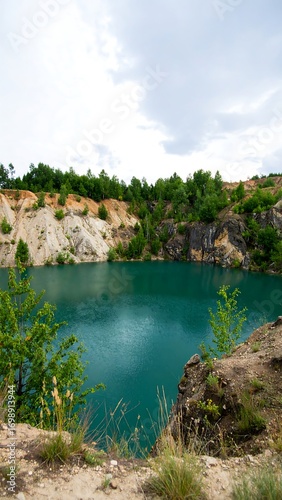 Quarry lake with surrounding hills