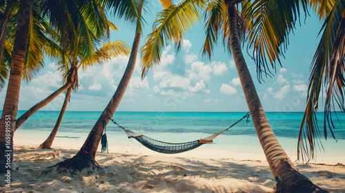 tropical beach with turquoise water, palm trees, hammock between trees, cinematic 16:9