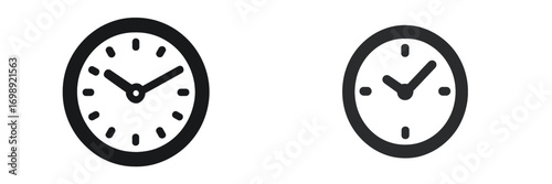 Clocks displaying different times captured in a minimalist style within a simple design
