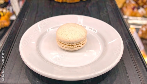 Single macaron on plate