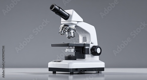 White microscope on gray background