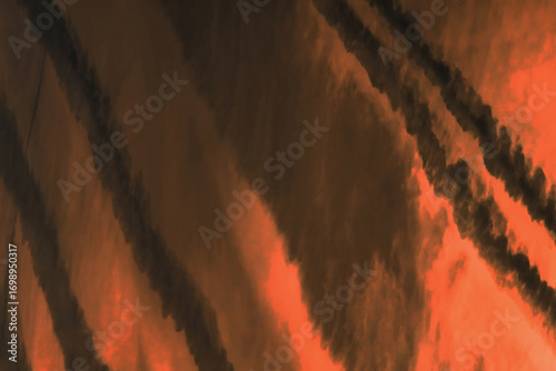 Traces airplane air trail jet line stripe sunset orange sky background