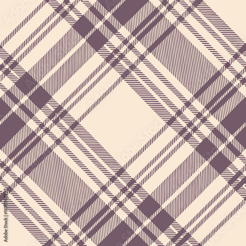 Soft tan backdrop beautifully showcases the intersecting aubergine lines of a stylish plaid pattern
