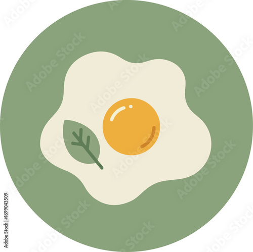 Close-up of a fried egg with runny yolk and crisp white edges on a green background with a single leaf