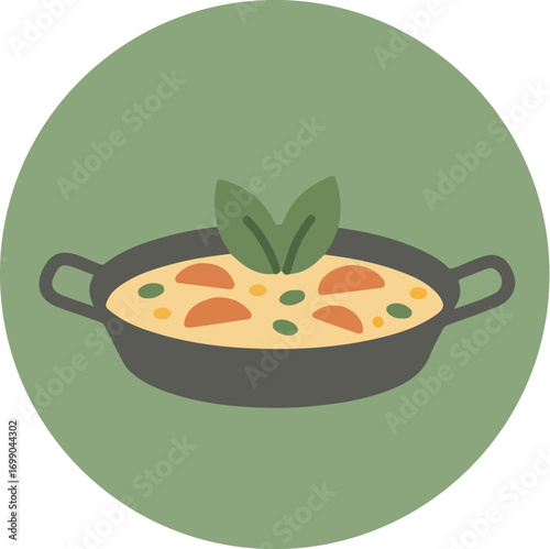Close-up of creamy dish in black cast-iron skillet with orange carrot slices and green herbs