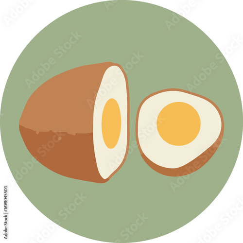 Halved boiled egg with brown shell and yellow yolk on green background