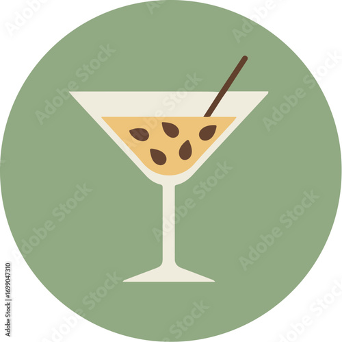 Close-up of a classic martini glass with a light brown beverage and dark brown garnish on a green background