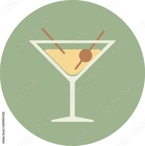 Classic martini in a triangular-bowled glass with olives on a cocktail pick, set against a light green background