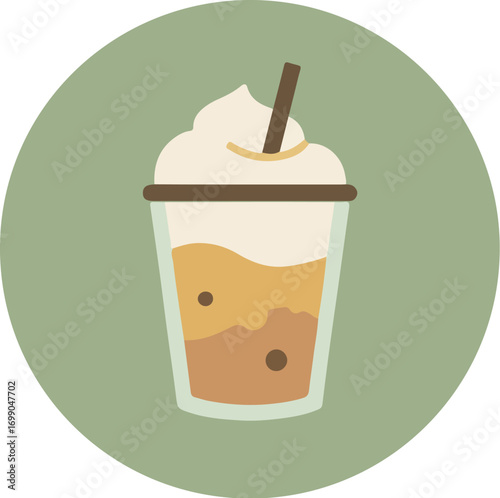 Clear plastic cup with layered iced coffee and whipped topping on green background