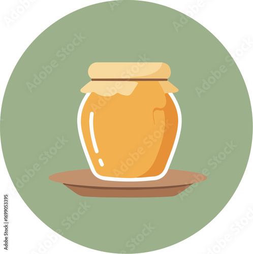 A jar of golden honey with a light brown lid on a wooden surface