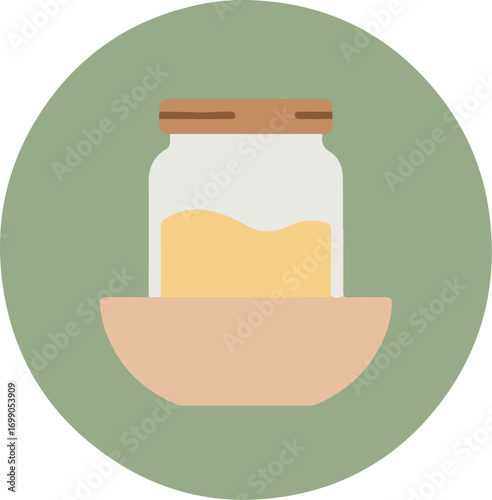 A jar of light yellow liquid with a rustic wooden lid on a light pink surface against a green gradient background