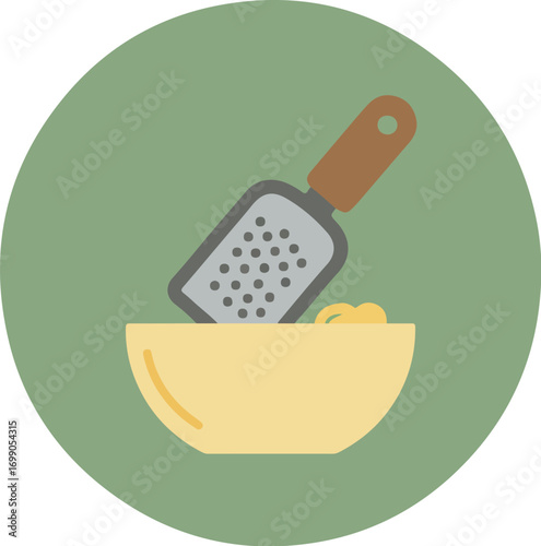 Close-up of a yellow bowl with mixed ingredients and a metallic grater with an orange handle