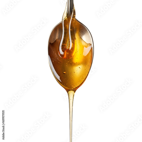 Honey dripping from spoon isolated on white background