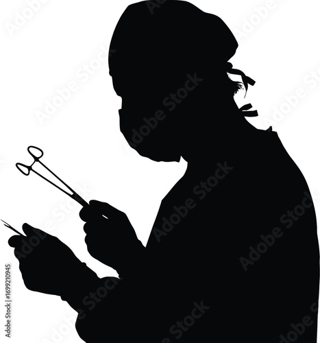 Surgeon holding surgical instruments medical operation