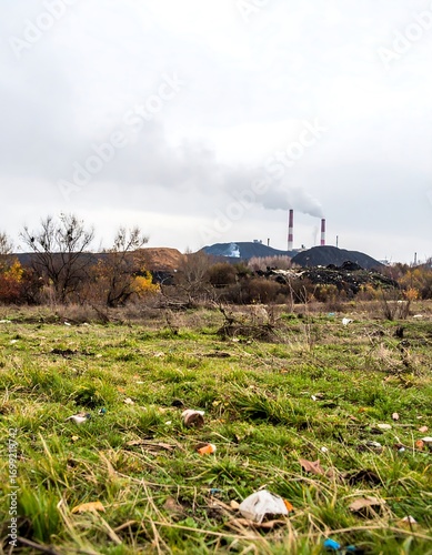 Polluted landscape with industrial smokestacks